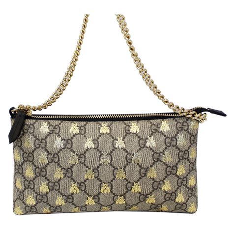 gucci linea bee gg supreme wristlet